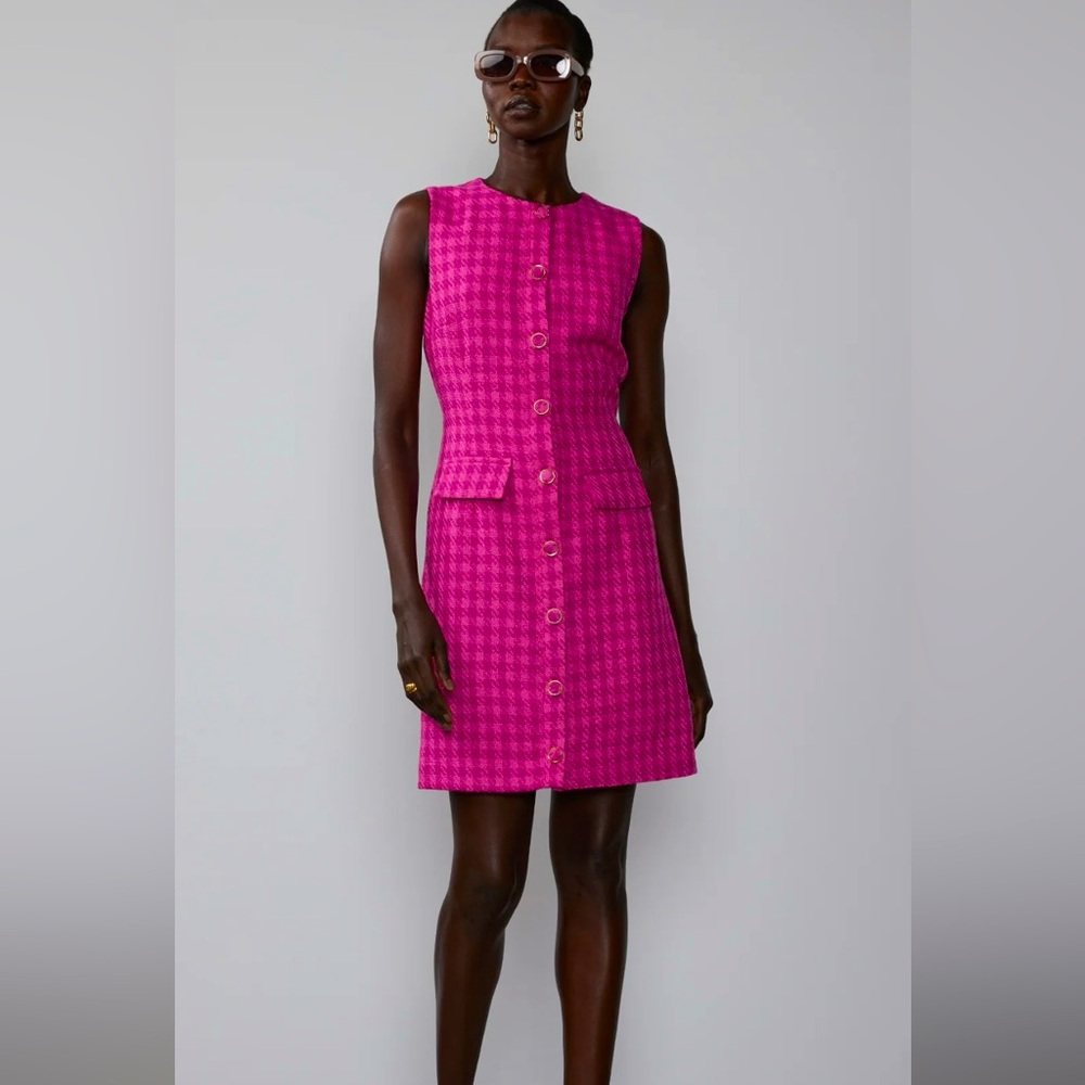 Work, church, wedding, yes. Double breast sleeveless houndstooth sheath dress.